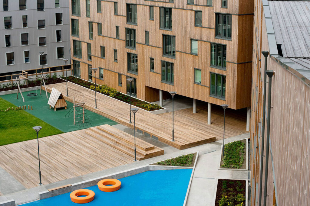 school building with benchmark pine decking and cladding