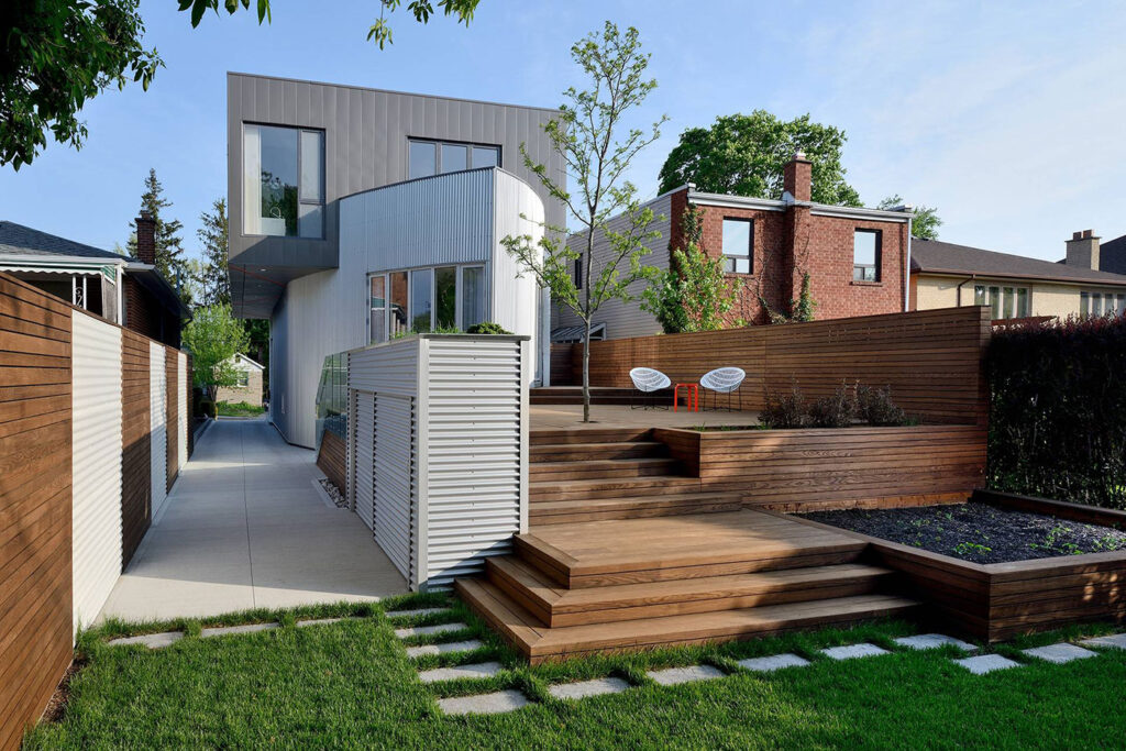 benchmark ash decking, stairs, and cladding of a home in Toronto
