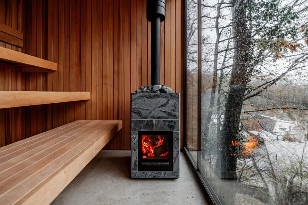 Custom Thermory sauna with thermo-aspen in forest