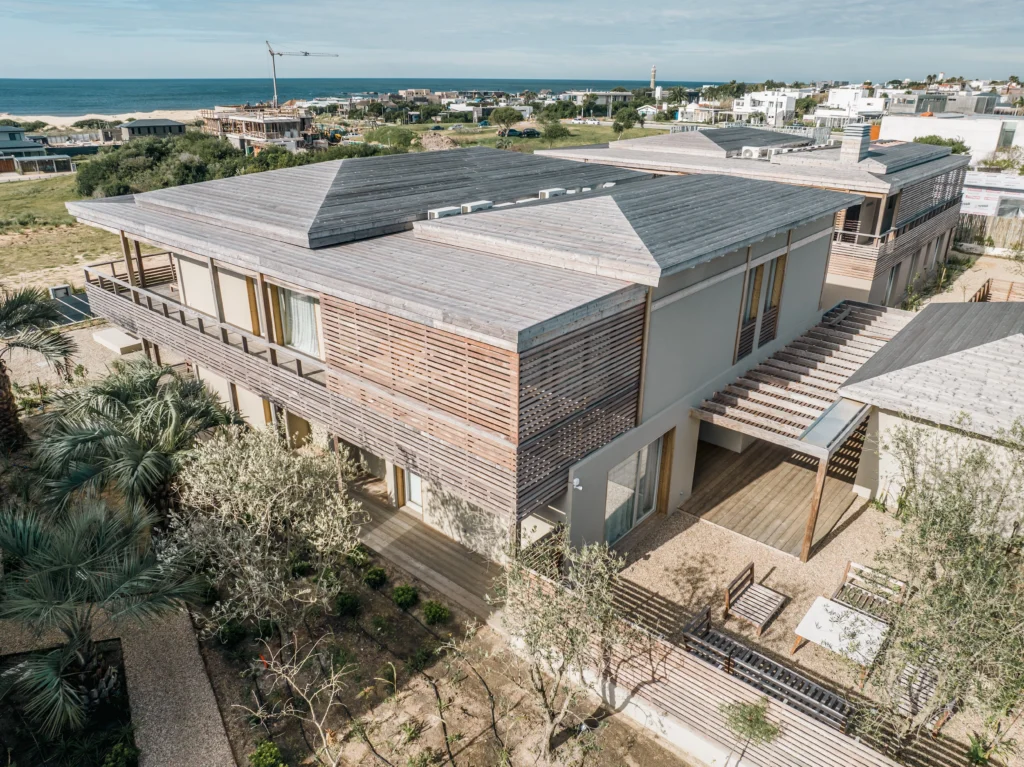 home in Uruguay with aged kodiak spruce cladding and decking