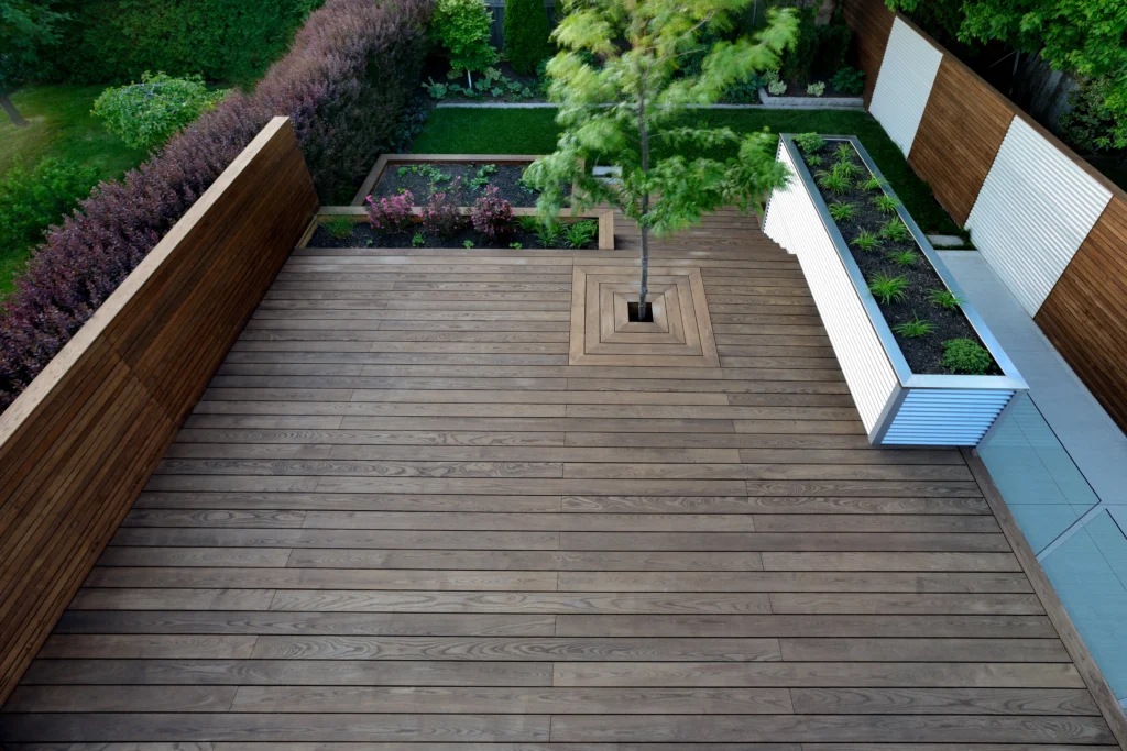 benchmark ash decking and cladding on backend of home in Toronto